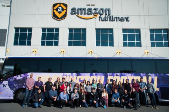 students at tour of amazon facility